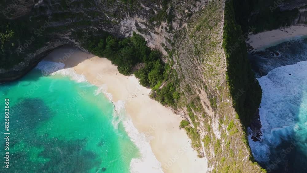 4K Drone shot of ocean wave washing over Kelingking Beach in Nusa Penida Video 4K Drone shot of ocean wave washing over Kelingking Beach in Nusa Penida Video