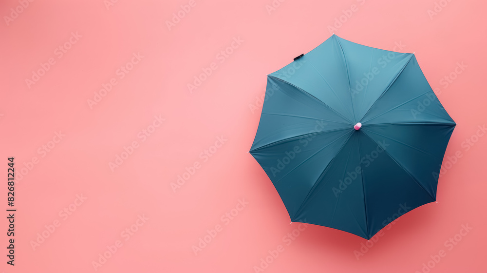 top view of a teal umbrella on a soft pink background, minimalist design, with copy space for text top view of a teal umbrella on a soft pink background, minimalist design, with copy space for text