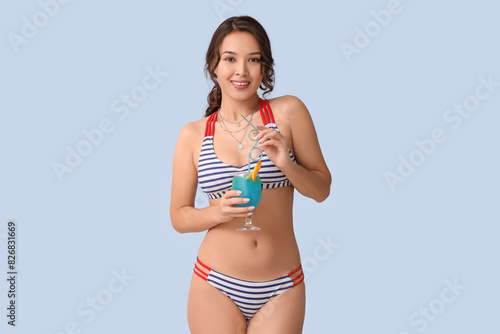 Sexy young woman in striped...