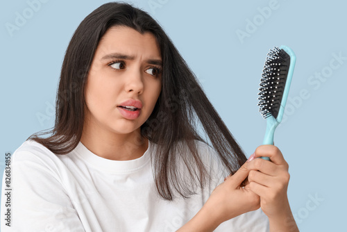 Stressed young woman with h...