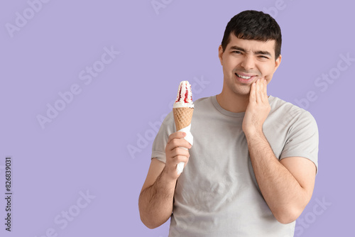 Young man with ice cream su...