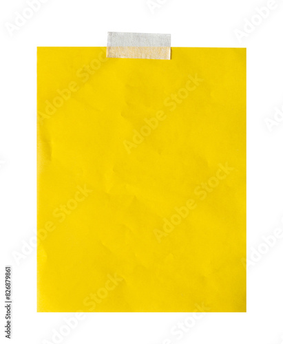 yellow note paper with tape isolated on white background