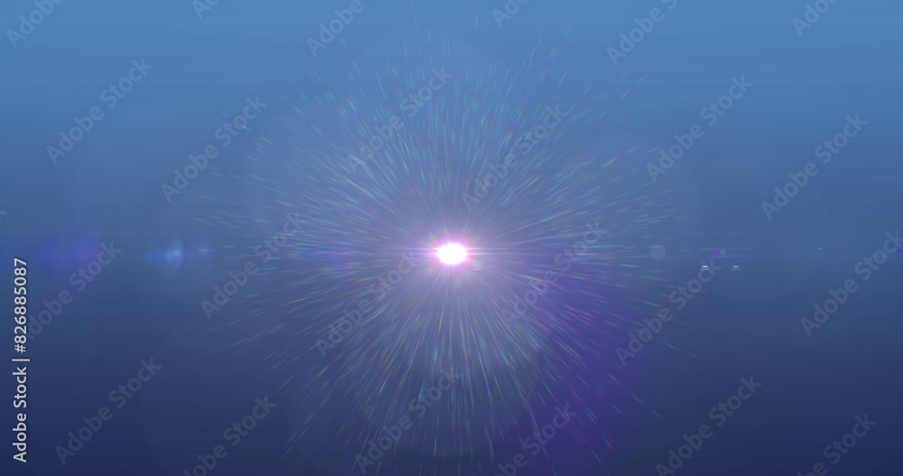 Obraz premium Bright light in center emitting colorful rays against blue background
