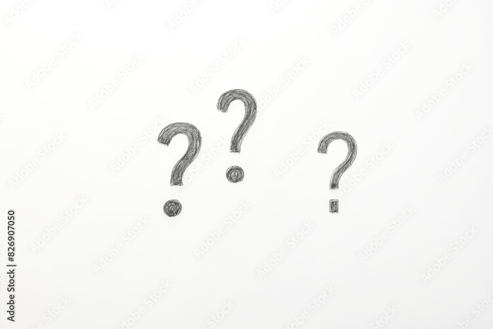 Hand-Drawn Question Marks on White Background Hand-Drawn Question Marks on White Background