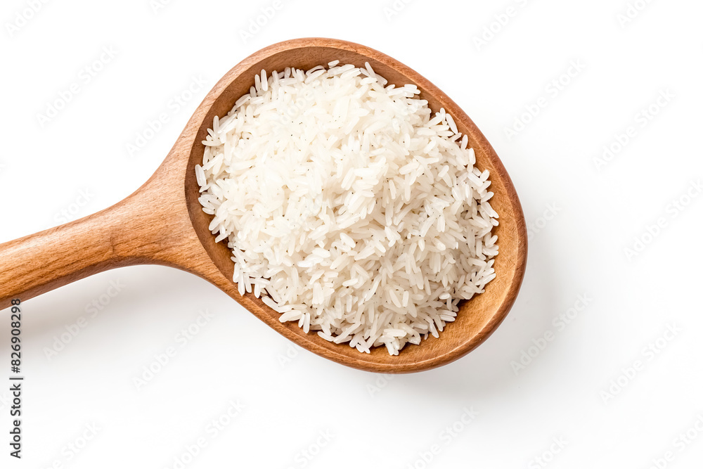 Close-up of white rice in a wooden spoon. Close-up of white rice in a wooden spoon.