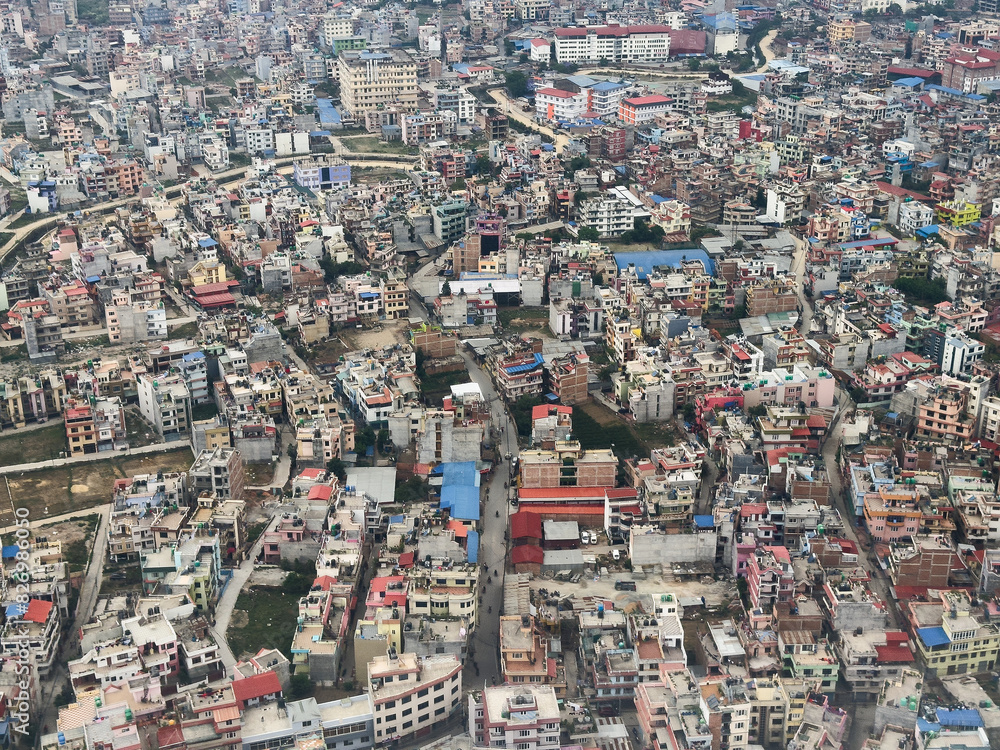Kathmandu, Nepal from the air showing urban density and an array of colours.
