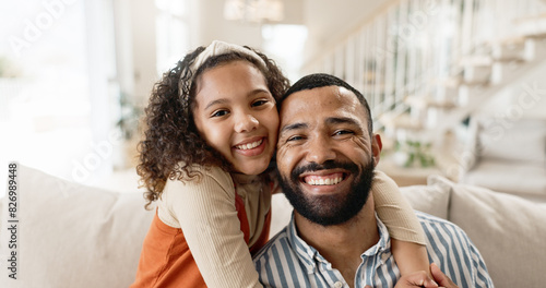Father, child and portrait with happy hug in home or morning bonding, apartment or connection. Man, daughter and love embrace on living room sofa for safety comfort or parent cuddle, family or smile