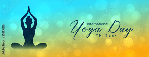 21st june world yoga day banner with bokeh effect