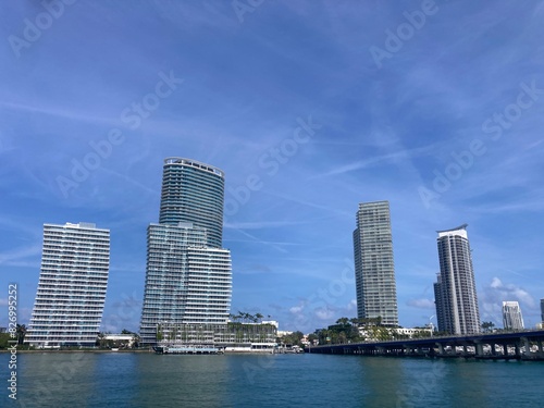 Modern high-rise buildings along Miami s scenic waterfront of Biscayne Bay under a clear blue sky