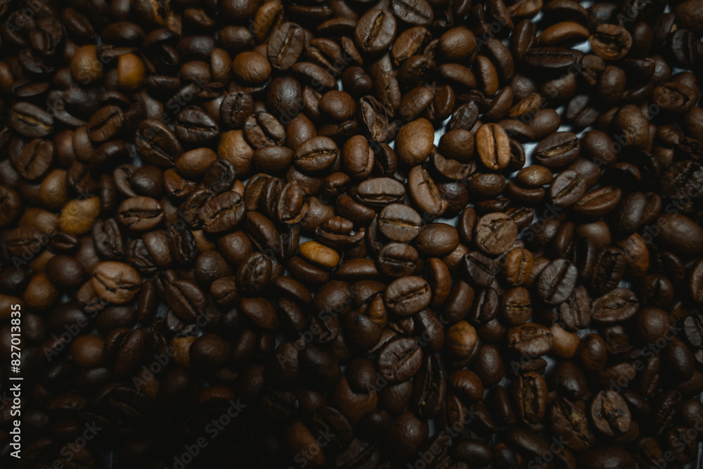 Naklejka premium Colorful background with coffee beans in close-up