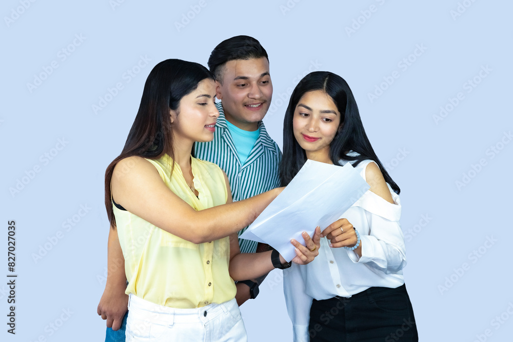 A group of copywriter friends with notepad, mobile phone, laptop giving gestures expresions and working together joyfully A group of copywriter friends with notepad, mobile phone, laptop giving gestures expresions and working together joyfully