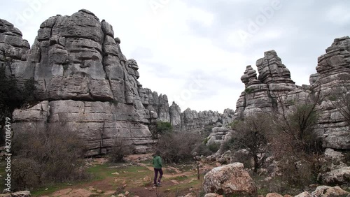 Woman in Torcal mountain, walking and wandering around, Antequera, Andalusia, Spain. High quality 4k footage