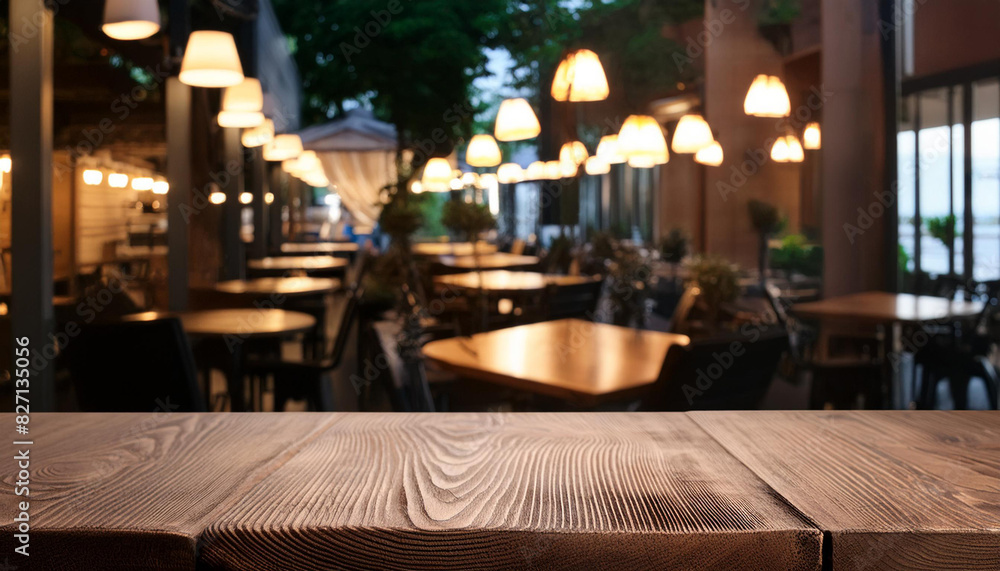 Empty wood table top on cafe restaurant in dark background, low light Empty wood table top on cafe restaurant in dark background, low light