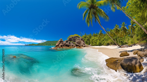 A panoramic HDR view of a secluded beach cove, with crystal-clear turquoise waters, lush green palm trees, and soft white sand, under a bright blue sky.