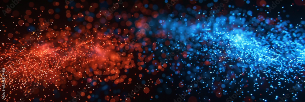 Fototapeta premium Dynamic collision of red and blue particles creating a vibrant and energetic visual effect in a digital space with glowing bokeh lights against a dark background 