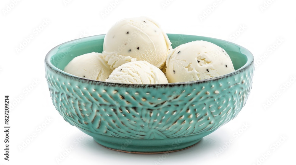 Ice cream vanilla balls with leaf mint in a turquoise bowl on white table with white wall background Ice cream vanilla balls with leaf mint in a turquoise bowl on white table with white wall background