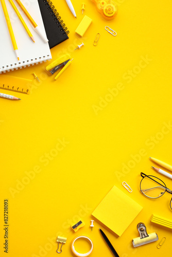 Принти на полотні Flat lay modern workspace with office supplies on yellow background