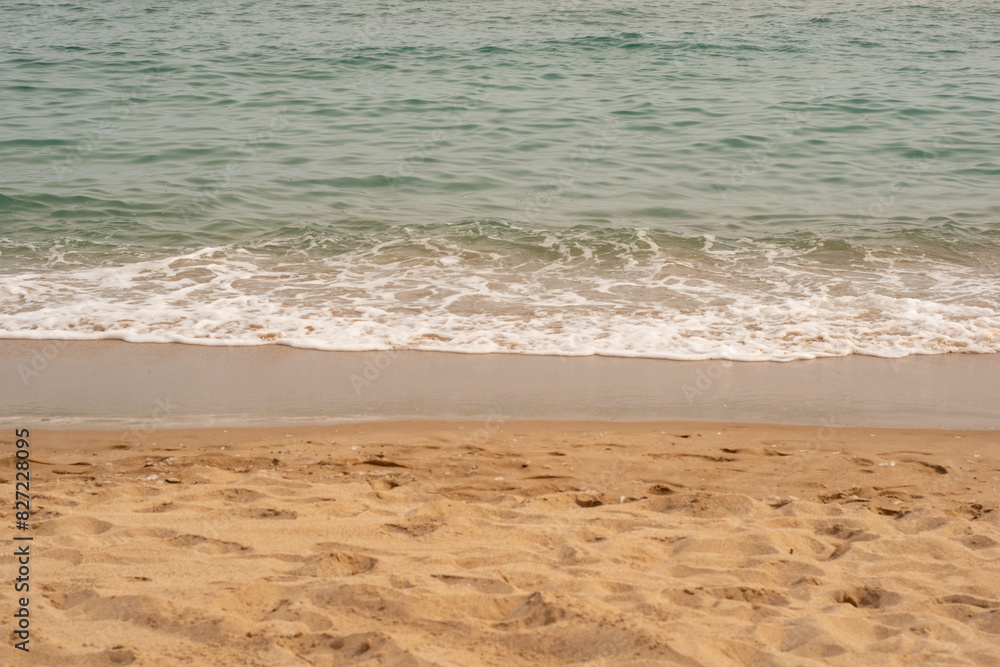 Sea wave and sand on the beach with copy space for text. Sea wave and sand on the beach with copy space for text.
