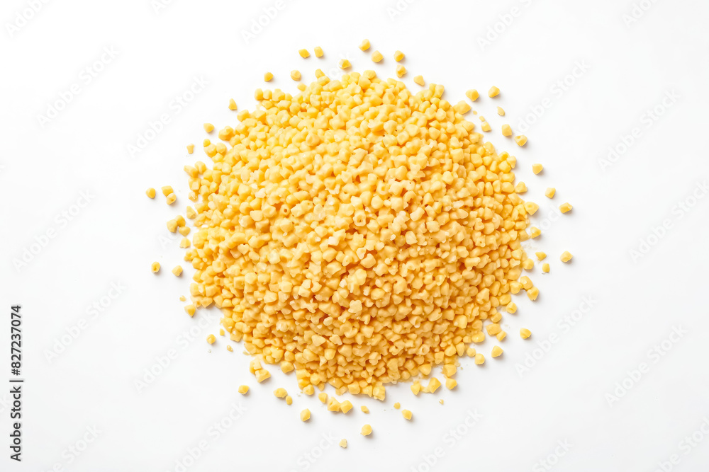 Close-up of small yellow granules on a white background Close-up of small yellow granules on a white background