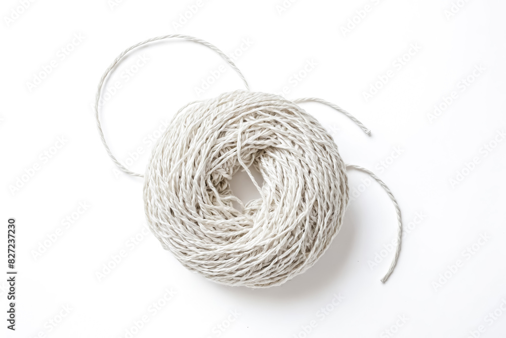 Close Up of a White Twine Ball on a White Background Close Up of a White Twine Ball on a White Background