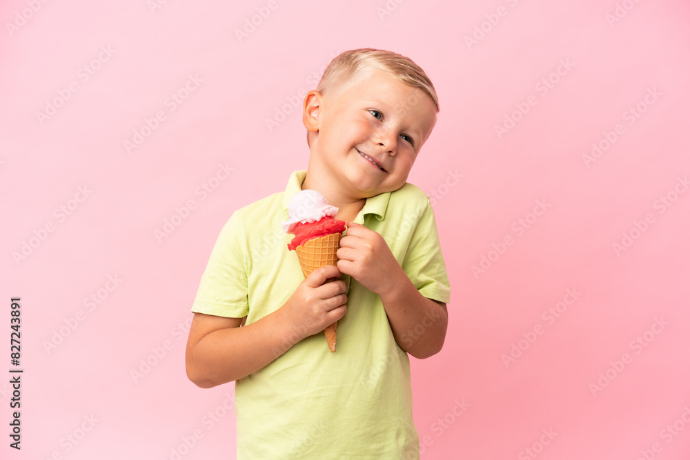 Little Russian boy with a cornet ice cream over isolated background Little Russian boy with a cornet ice cream over isolated background