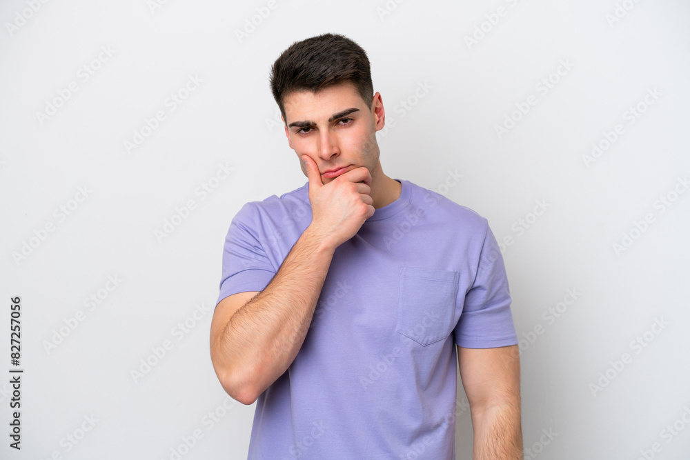 Young caucasian man isolated on white background having doubts Young caucasian man isolated on white background having doubts
