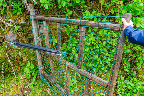 Fotografie archaic and rudimentary spring system for closing bicycle air chamber doors