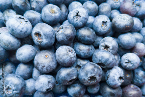 Many a lot of ripe juicy mature blueberries as superfood pattern.Healthy sweet food eating.