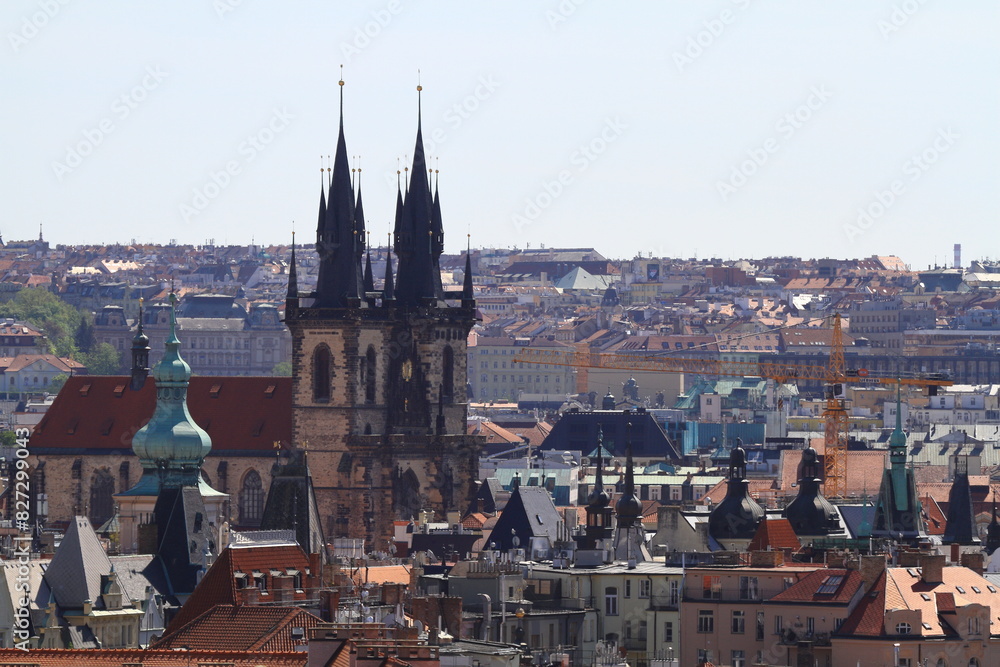 Obraz premium Historic town center with ancient buildings and distant spires, Prague