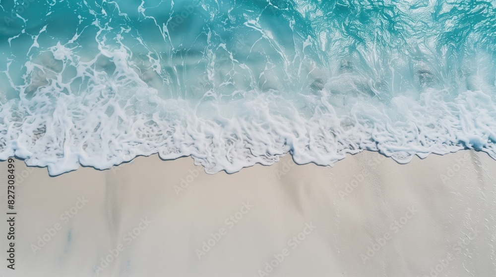 Naklejka premium Close-Up of White Sand and Crystal Blue Sea