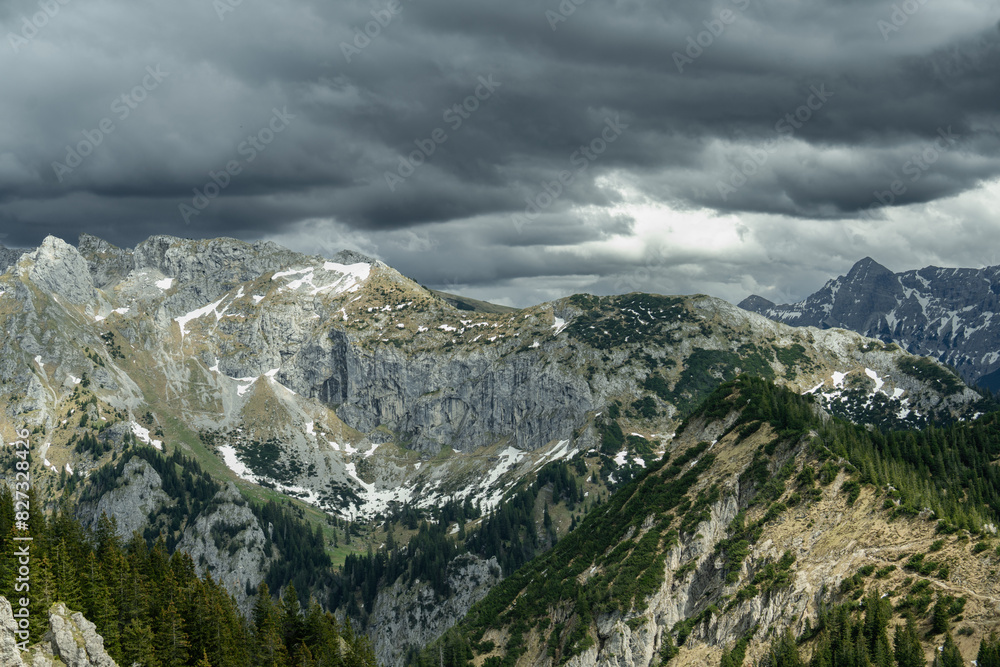 Fototapeta premium peaks of mountain ranges in cloudy weather