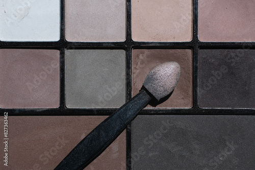 A nude matte eyeshadow in a palette.