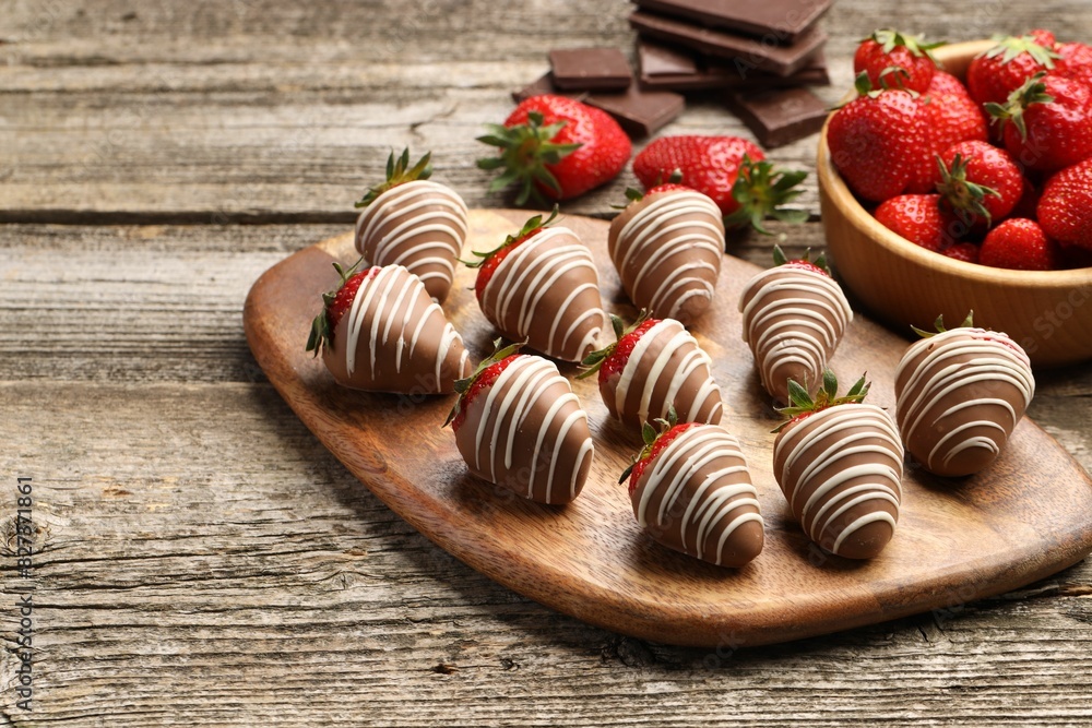 Delicious chocolate covered strawberries on wooden table. Space for text Delicious chocolate covered strawberries on wooden table. Space for text