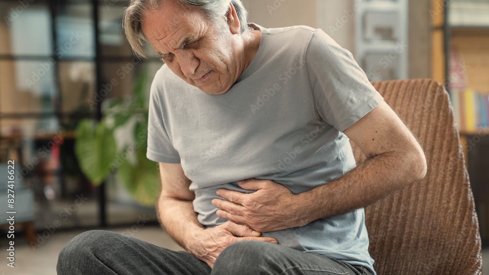 Senior man with stomach pain	