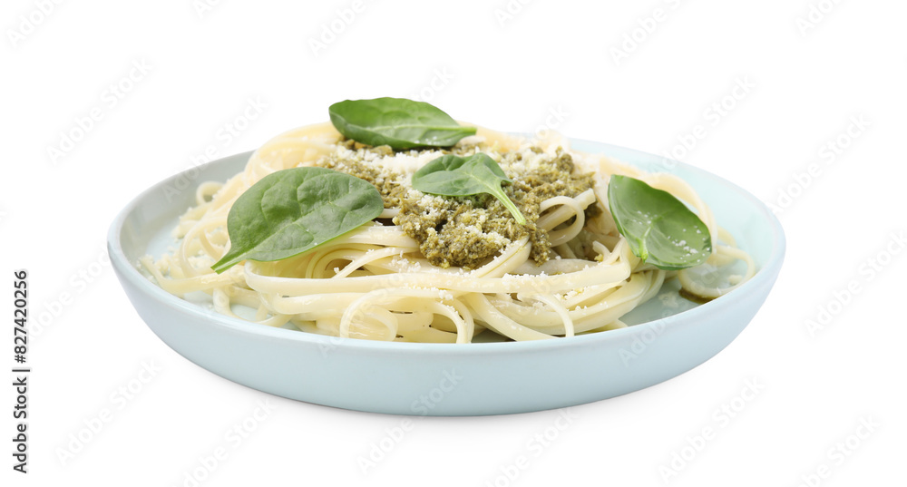 Tasty pasta with spinach, cheese and sauce isolated on white Tasty pasta with spinach, cheese and sauce isolated on white