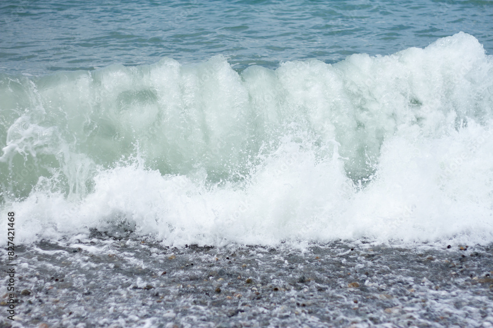 Sea wave crashing on the shore Sea wave crashing on the shore