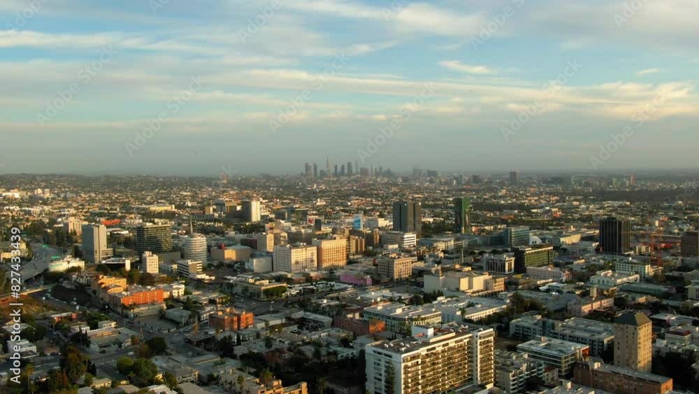 Aerial Panning Shot Of Buildings In Modern Residential City Under Cloudy Sky On Sunny Day - Culver City, California Aerial Panning Shot Of Buildings In Modern Residential City Under Cloudy Sky On Sunny Day - Culver City, California