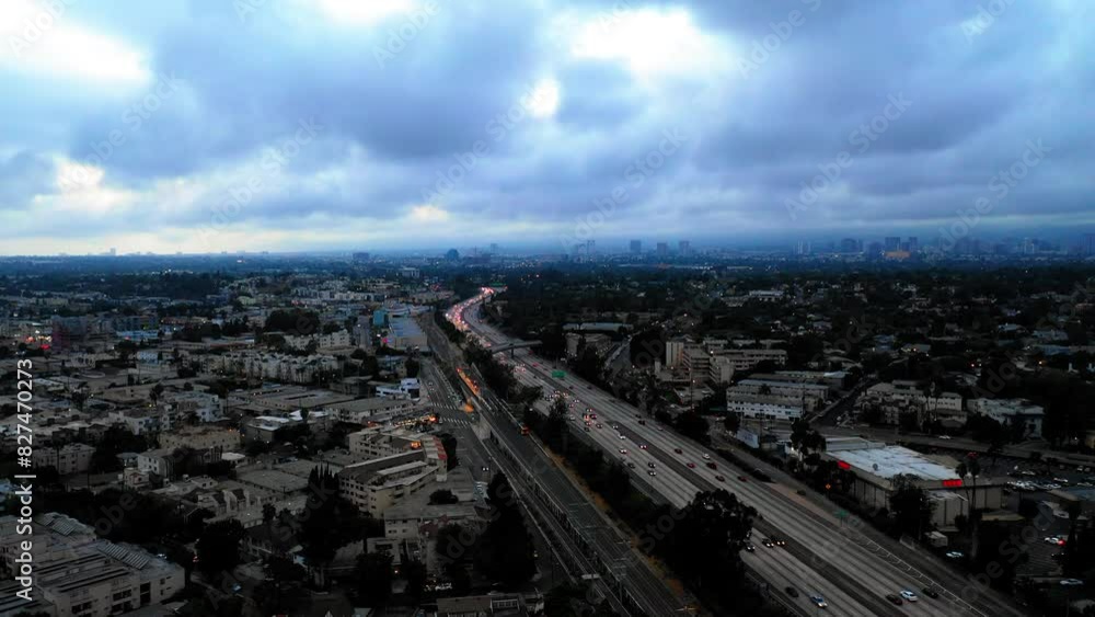 Aerial Forward Scenic View Of Cars Moving On Bridge Roads In Residential City Under Cloudy Sky - Culver City, California Aerial Forward Scenic View Of Cars Moving On Bridge Roads In Residential City Under Cloudy Sky - Culver City, California