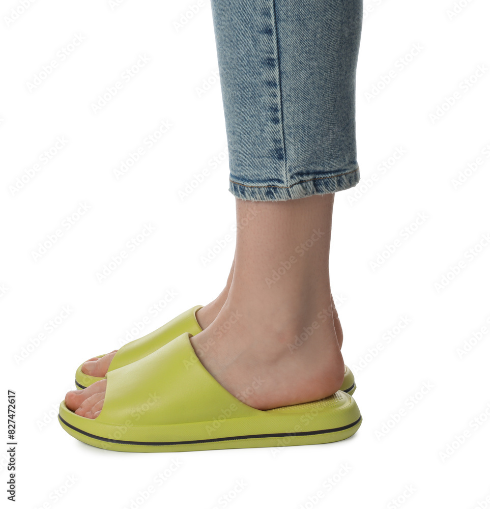 Woman in green slippers on white background, closeup Woman in green slippers on white background, closeup