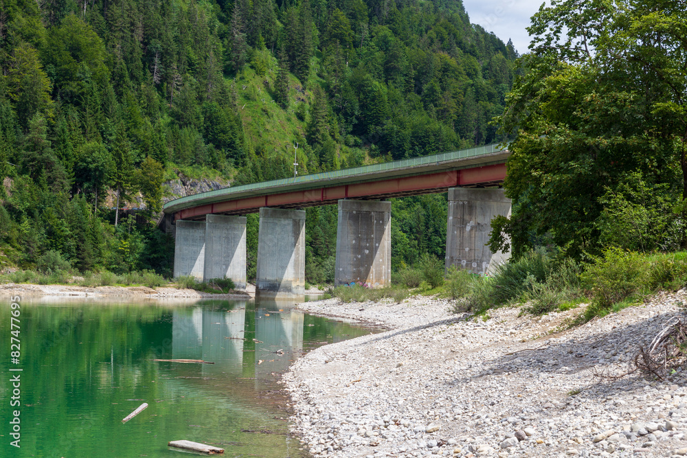 Faller-Klamm-Brücke with lake Sylvenstein Reservoir and mountain alps panorama in Bavaria, Germany Faller-Klamm-Brücke with lake Sylvenstein Reservoir and mountain alps panorama in Bavaria, Germany