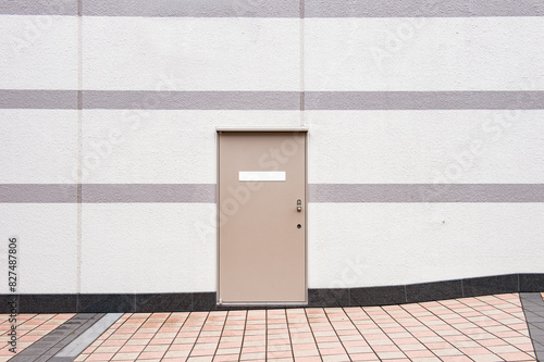 sidewalk by street wall  and  door