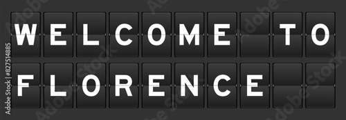 Black color analog flip board with word welcome to florence on gray background