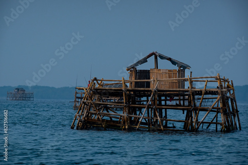 a floating bamboo fishermen's settlement over Jakarta Bay Indonesia, thousands islands or kepulauan seribu