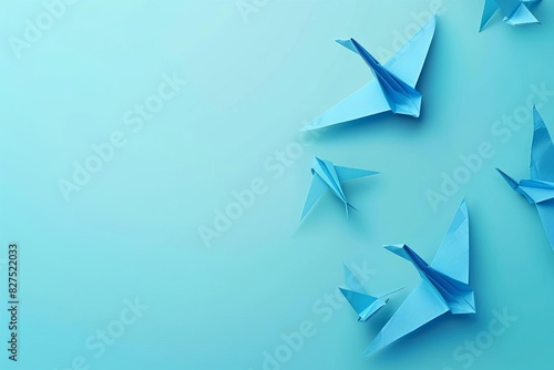 blue origami birds on blue background minimalist design banner illustration photo