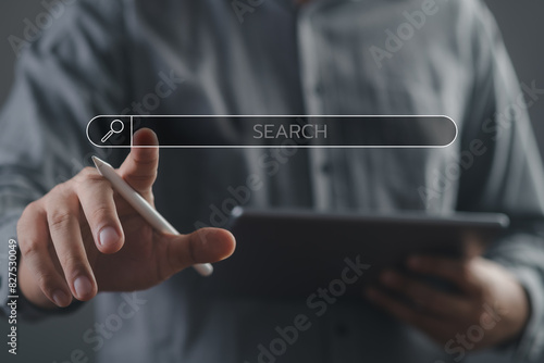 man's hands are finger point to Searching for information. Using Search Console with your website. Data Search Technology Search Engine Optimization. Online business search a job for work