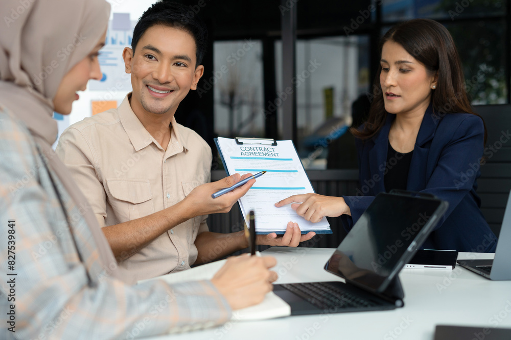 Business people working as a good team in the office. Successful teamwork in a meeting, workplace concept. Business people working as a good team in the office. Successful teamwork in a meeting, workplace concept.