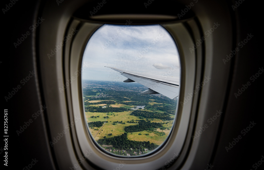 the serene beauty from an airplane window, featuring the wing silhouetted against an expansive, cloud-filled sky, instilling a sense of height and peacefulness. the serene beauty from an airplane window, featuring the wing silhouetted against an expansive, cloud-filled sky, instilling a sense of height and peacefulness.