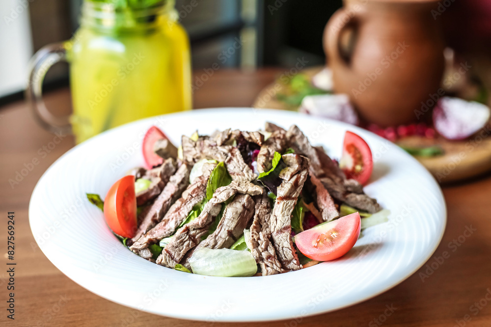 White Plate With Topped Meat and Vegetables White Plate With Topped Meat and Vegetables