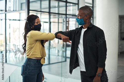 People  social distance and greeting in pandemic with mask for protection  safety and health as coworkers. Woman  man and connection in agency in unity  collaboration and team for awareness at work