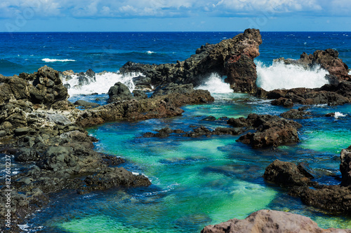 Tidepools and rocky coast at Ho’okipa Beach Park, Maui photo